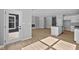 Bright, open-concept living space combines kitchen, dining, and living areas with modern finishes and ample natural light at 3509 Wrangler Dr, Bargersville, IN 46106