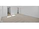 Bright bedroom with neutral carpet and white walls at 6114 Paperbark Way, Indianapolis, IN 46259