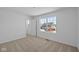 Bright bedroom with large window offering plenty of natural light at 6114 Paperbark Way, Indianapolis, IN 46259