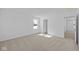 Open bedroom space with natural light shining through window and doors at 6114 Paperbark Way, Indianapolis, IN 46259