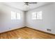 Well-lit bedroom with hardwood floors and windows at 6137 E Southern Ave, Indianapolis, IN 46203