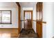 Entryway with wood floors and a hardwood door at 6137 E Southern Ave, Indianapolis, IN 46203