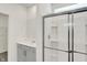 Modern bathroom features a glass shower, vanity, and neutral finishes at 68 Sterling Pl, New Whiteland, IN 46184