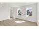 The light-filled bedroom has two large windows at 68 Sterling Pl, New Whiteland, IN 46184