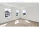 This spacious bedroom has three windows at 68 Sterling Pl, New Whiteland, IN 46184