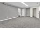 Spacious unfinished basement with neutral paint and carpet at 9829 Chambray Dr, Indianapolis, IN 46280