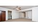 Spacious bedroom featuring neutral carpeting, ceiling fan, and ensuite bathroom at 13834 Keams Dr, Fishers, IN 46038