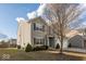 Charming two-story home with gray siding, dark shutters, and a well-maintained lawn and landscape at 13834 Keams Dr, Fishers, IN 46038