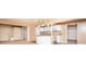 Open concept living room and kitchen combination featuring white cabinets and recessed lighting at 13834 Keams Dr, Fishers, IN 46038