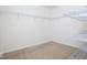 Spacious walk-in closet with carpeted floor, white walls and wire shelving at 13834 Keams Dr, Fishers, IN 46038