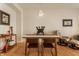 Open concept dining area with hardwood floors and modern decor at 223 N Alabama St, Indianapolis, IN 46204