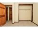 Spacious bedroom with built-in shelving and wood doors at 502 E 9Th St, Sheridan, IN 46069