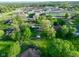 This aerial view highlights the property's serene setting within a lush, green neighborhood at 56 Hadley Woodland St, Mooresville, IN 46158
