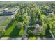 An aerial view of the neighborhood shows proximity to the high school sports fields at 56 Hadley Woodland St, Mooresville, IN 46158