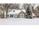 Brick front house with snow covered lawn at 7241 Merriam Rd, Indianapolis, IN 46240