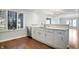 Modern kitchen with white cabinets, quartz countertops, and stainless steel appliances at 9110 W Point Dr, Indianapolis, IN 46268