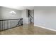 Dining room with hardwood floors and staircase access at 9426 Park Meridian Dr, Indianapolis, IN 46260