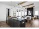 Open concept kitchen, dining, and living area with modern finishes and plenty of natural light at 17368 Pinellas Ave, Westfield, IN 46074