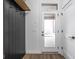 Mudroom area featuring black cabinet storage and a door to the outside at 17368 Pinellas Ave, Westfield, IN 46074