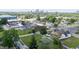 Aerial view showcasing the neighborhood, homes, and downtown skyline in the distance at 2218 N Arsenal Ave, Indianapolis, IN 46218