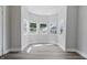 Brightly lit bay window with new floors and view of neighborhood at 2218 N Arsenal Ave, Indianapolis, IN 46218