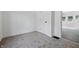 Bedroom with neutral carpet with a large doorway leading to another room at 2218 N Arsenal Ave, Indianapolis, IN 46218