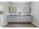 Well-lit kitchen with stylish cabinets, and contemporary design elements at 2218 N Arsenal Ave, Indianapolis, IN 46218
