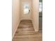 Inviting entryway with wood-look flooring and a view into the adjacent living space at 3922 Holly Brook Dr, Westfield, IN 46062