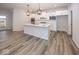 Beautiful kitchen featuring white cabinetry, stainless steel appliances, and an island with pendant lights at 3922 Holly Brook Dr, Westfield, IN 46062