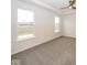 Spacious main bedroom features plush carpet, two windows, and a modern ceiling fan at 3922 Holly Brook Dr, Westfield, IN 46062
