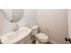 Powder room with modern fixtures and pedestal sink at 3922 Holly Brook Dr, Westfield, IN 46062