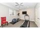 Home gym with treadmill and elliptical machine at 520 Bridgemont Ln, Carmel, IN 46032
