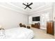 Bright bedroom featuring a comfortable bed and a relaxing seating area at 520 Bridgemont Ln, Carmel, IN 46032