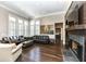 Spacious living room with fireplace and hardwood floors at 520 Bridgemont Ln, Carmel, IN 46032