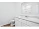 Stylish bathroom with a modern vanity, quartz countertop, and a sleek mirror at 7840 Magnolia St, New Palestine, IN 46163