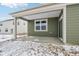 Covered patio with concrete surface, features a window and sliding door at 7840 Magnolia St, New Palestine, IN 46163