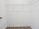 Walk-in closet with carpet floor and wire shelving at 7840 Magnolia St, New Palestine, IN 46163