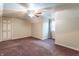 This is a bedroom with brown carpet, cream colored walls and a ceiling fan at 11197 N Gasburg Rd, Mooresville, IN 46158