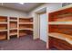 Unique room with built-in wood shelving and desk space, offering versatility at 11197 N Gasburg Rd, Mooresville, IN 46158