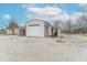Detached white garage with multiple bays and lean-to areas at 11197 N Gasburg Rd, Mooresville, IN 46158