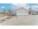 Spacious white garage with multiple bays, providing ample storage and parking at 11197 N Gasburg Rd, Mooresville, IN 46158