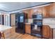 Updated kitchen features stainless steel appliances and a large counter space at 11197 N Gasburg Rd, Mooresville, IN 46158