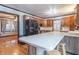 Bright kitchen with an island, modern appliances, and wood cabinets at 11197 N Gasburg Rd, Mooresville, IN 46158