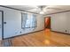 Spacious living room with hardwood floors, staircase, and bright windows at 11197 N Gasburg Rd, Mooresville, IN 46158