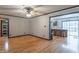 Open-concept living room boasts hardwood floors and neutral walls at 11197 N Gasburg Rd, Mooresville, IN 46158