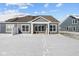 Backyard view with footprints in the snow at 16892 Cattle Hollow Ln, Noblesville, IN 46060