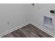 Unfinished basement with grey floors and hookups for washer and dryer at 16892 Cattle Hollow Ln, Noblesville, IN 46060