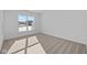 Bright bedroom with a large window, offering plenty of natural light at 16892 Cattle Hollow Ln, Noblesville, IN 46060