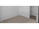 Bedroom with neutral carpet, closet, and white trim at 16892 Cattle Hollow Ln, Noblesville, IN 46060
