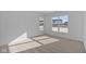 Bright bedroom with plush carpeting and large windows offering abundant natural light at 16892 Cattle Hollow Ln, Noblesville, IN 46060